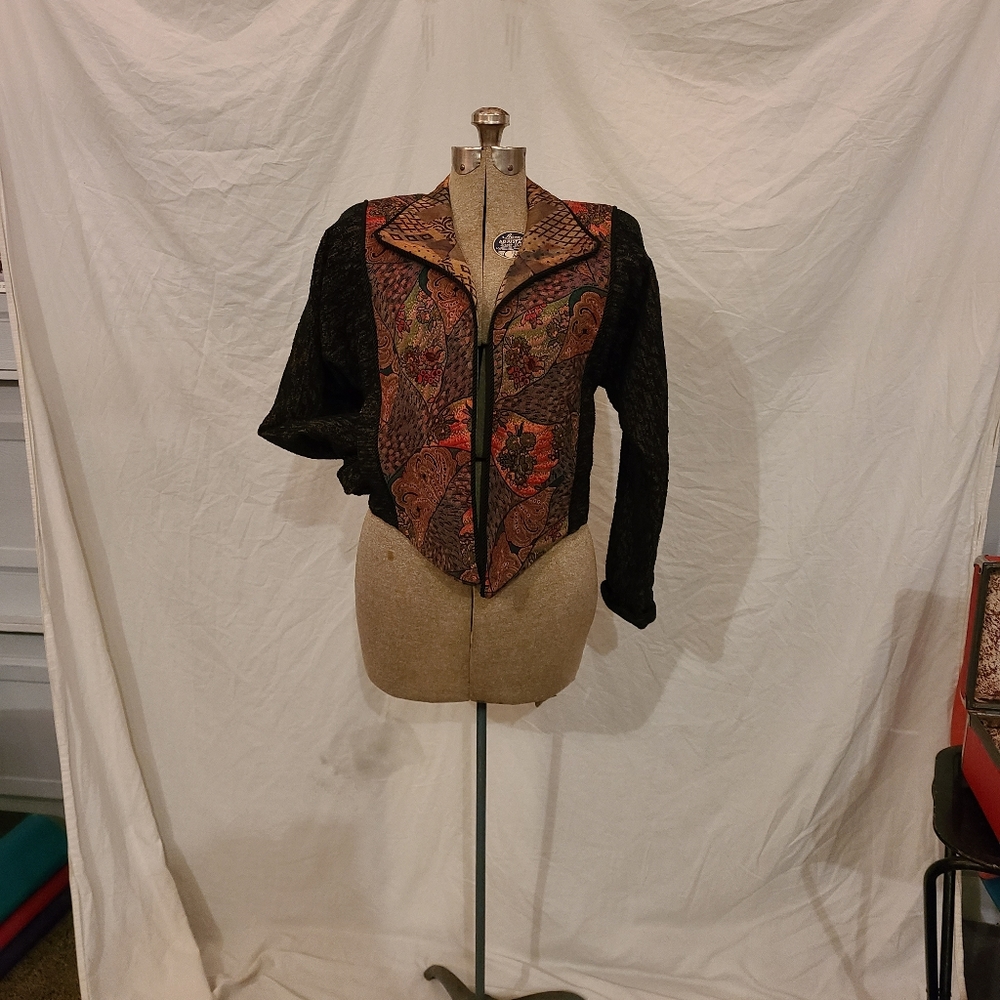 Cropped jacket, size small.